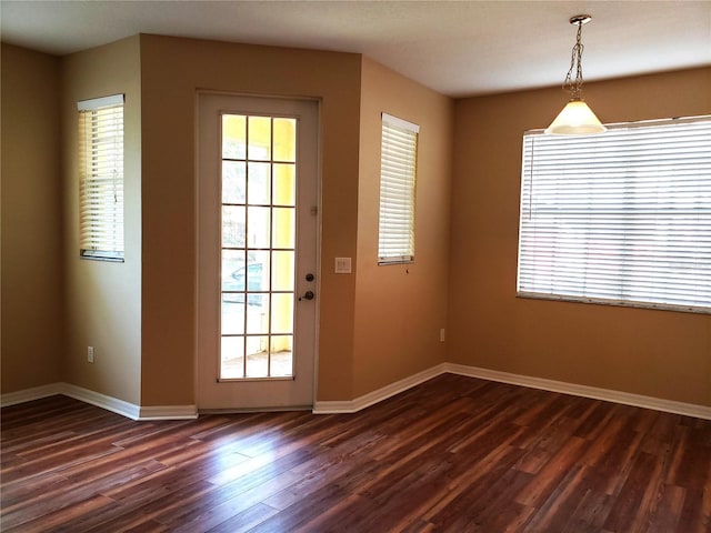 3658 Oakdale Cir Unit 100, Oviedo, FL 32765 - entryway with dark wood-style floors and baseboards