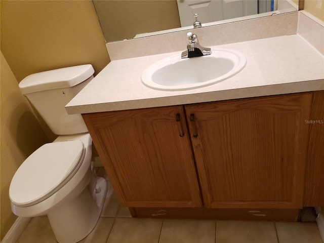 3658 Oakdale Cir Unit 100, Oviedo, FL 32765 - bathroom featuring toilet, vanity, and tile patterned flooring