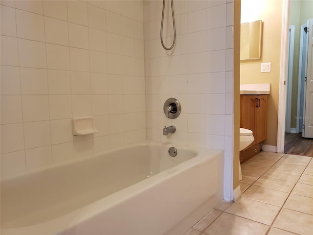 3658 Oakdale Cir Unit 100, Oviedo, FL 32765 - bathroom featuring vanity, tile patterned flooring, shower / tub combination, baseboards, and toilet