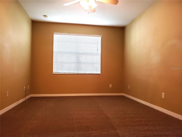 3658 Oakdale Cir Unit 100, Oviedo, FL 32765 - unfurnished room with ceiling fan, dark carpet, and baseboards