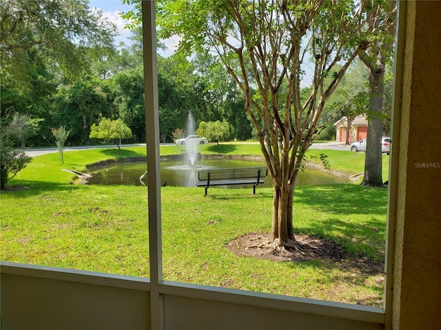 3658 Oakdale Cir Unit 100, Oviedo, FL 32765 - view of home's community featuring a yard and a water view