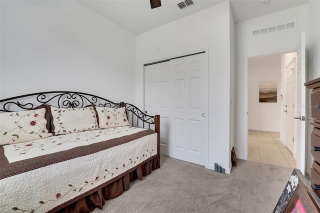 387 Avi Ct, Titusville, FL 32796 - carpeted bedroom featuring a ceiling fan, a closet, and baseboards