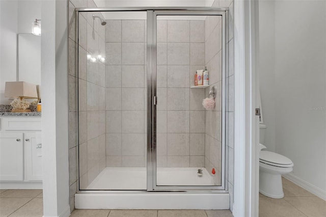 387 Avi Ct, Titusville, FL 32796 - full bathroom with toilet, vanity, tile patterned floors, and a stall shower