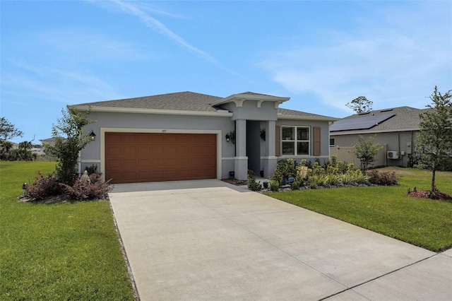 387 Avi Ct, Titusville, FL 32796 - view of front of property with stucco siding, an attached garage, driveway, and a front yard