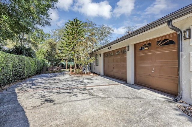 612 Golden Dawn, Apopka, FL 32712 - garage featuring asphalt driveway