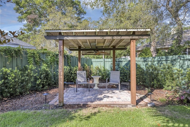 612 Golden Dawn, Apopka, FL 32712 - fenced backyard with ceiling fan and a patio