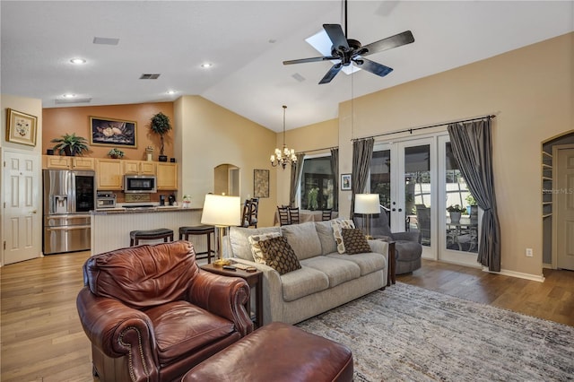 612 Golden Dawn, Apopka, FL 32712 - living area featuring a chandelier, high vaulted ceiling, ceiling fan, light wood finished floors, and french doors
