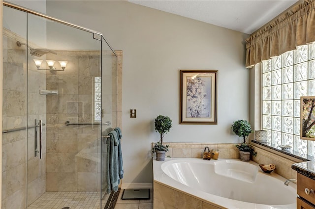 612 Golden Dawn, Apopka, FL 32712 - bathroom with healthy amount of natural light, a garden tub, and a shower stall