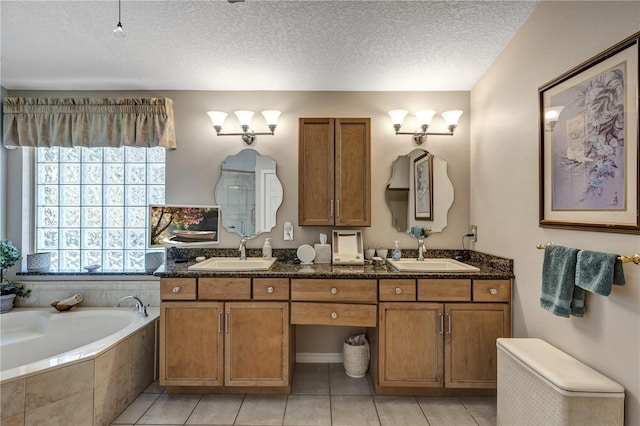 612 Golden Dawn, Apopka, FL 32712 - full bath featuring a garden tub, double vanity, tile patterned floors, and a textured ceiling
