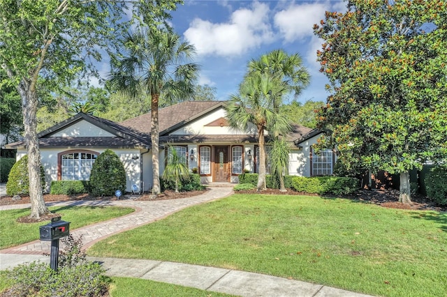 612 Golden Dawn, Apopka, FL 32712 - ranch-style home with a front yard and stucco siding