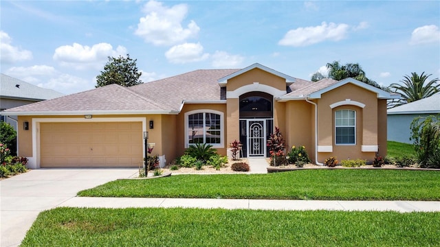27143 Nostalgia Dr, Leesburg, FL 34748 - single story home with stucco siding, a garage, a front lawn, concrete driveway, and roof with shingles