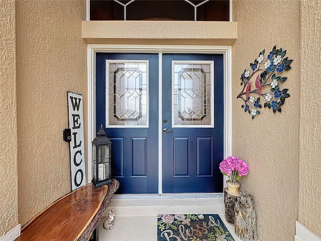 27143 Nostalgia Dr, Leesburg, FL 34748 - doorway to property with stucco siding