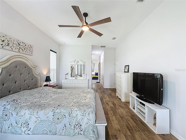 27143 Nostalgia Dr, Leesburg, FL 34748 - bedroom featuring dark wood-style flooring, baseboards, and a ceiling fan