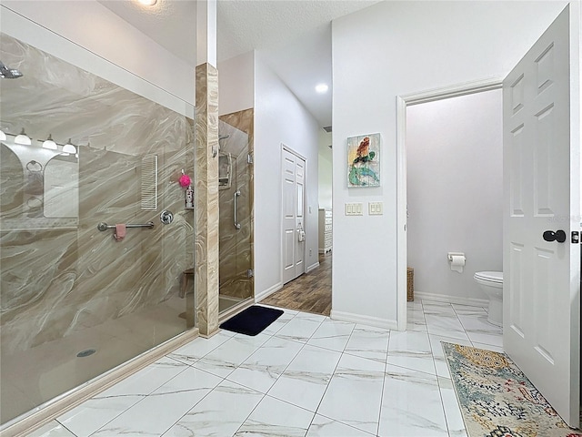 27143 Nostalgia Dr, Leesburg, FL 34748 - full bathroom with a stall shower, marble finish flooring, toilet, baseboards, and recessed lighting