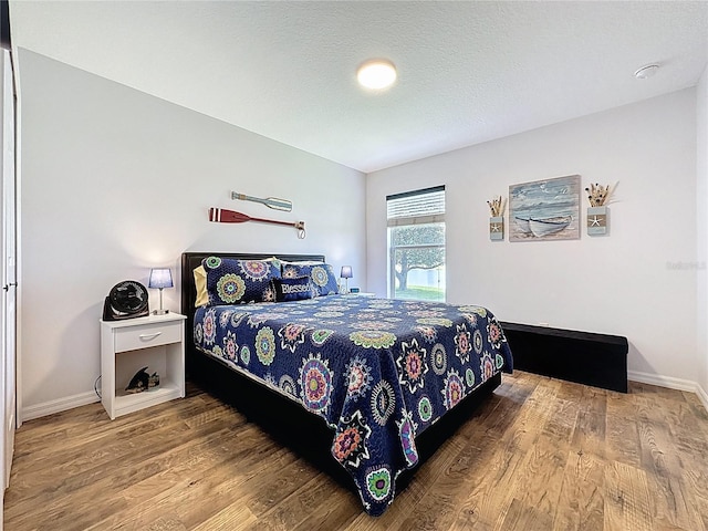 27143 Nostalgia Dr, Leesburg, FL 34748 - bedroom with wood finished floors and baseboards