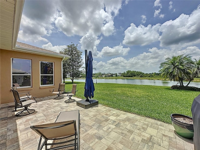 27143 Nostalgia Dr, Leesburg, FL 34748 - view of patio / terrace with a water view