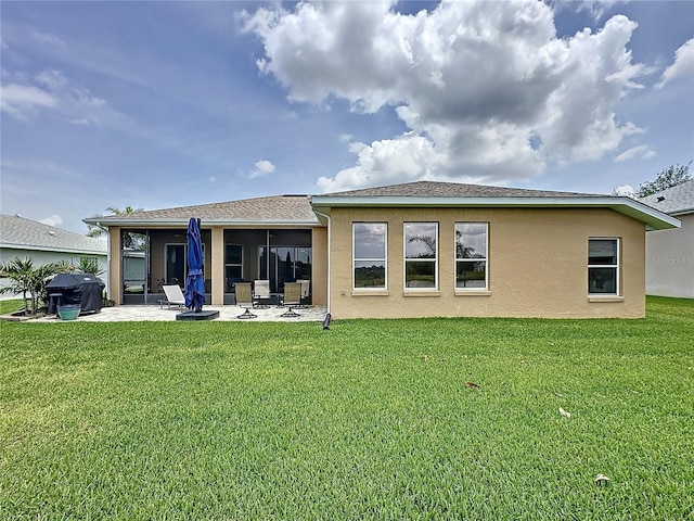 27143 Nostalgia Dr, Leesburg, FL 34748 - rear view of house featuring a patio, stucco siding, and a lawn
