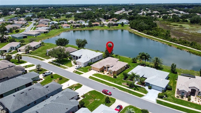 27143 Nostalgia Dr, Leesburg, FL 34748 - aerial view of residential area with a large body of water