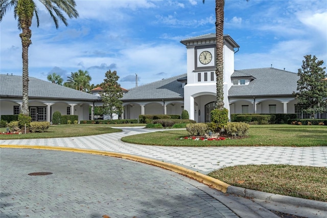 27143 Nostalgia Dr, Leesburg, FL 34748 - view of building exterior with curved driveway