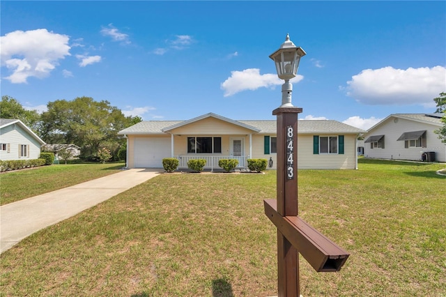 8443 SW 109th Pl, Ocala, FL 34481 - single story home with a porch, a front yard, and a garage