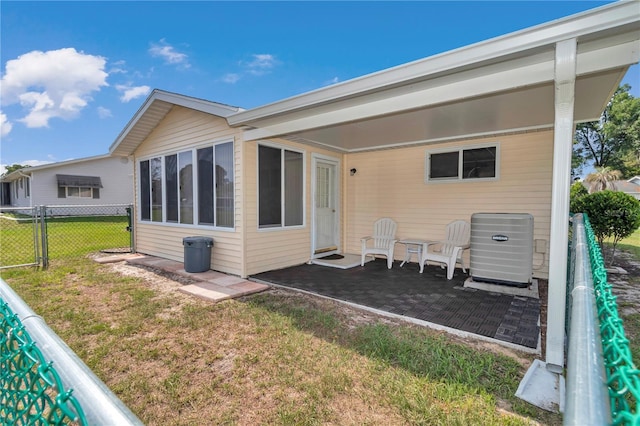 8443 SW 109th Pl, Ocala, FL 34481 - rear view of house with a patio area and central AC