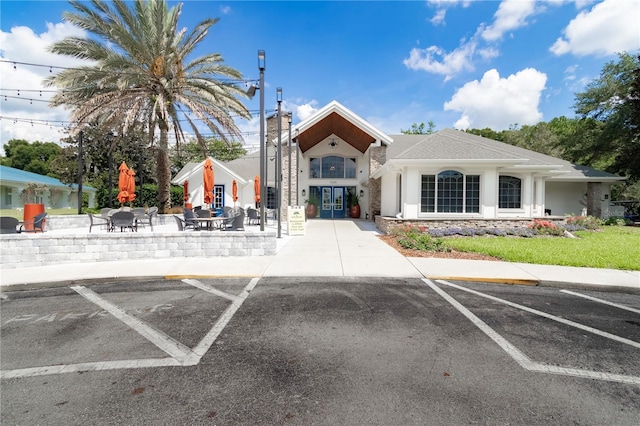8443 SW 109th Pl, Ocala, FL 34481 - view of building exterior with uncovered parking