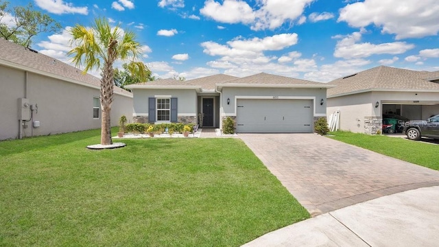 6013 Mount Zion Cir, Deland, FL 32724 - ranch-style home with decorative driveway, a garage, stucco siding, stone siding, and a front lawn