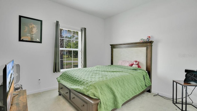 6013 Mount Zion Cir, Deland, FL 32724 - bedroom with light carpet and baseboards