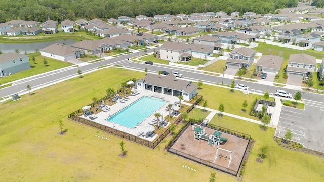 6013 Mount Zion Cir, Deland, FL 32724 - bird's eye view of a pool area, a nearby body of water, and a forest