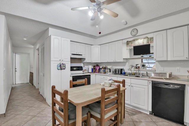 16476 107th Dr N, Jupiter, FL 33478 - kitchen with black dishwasher, range with electric stovetop, a sink, under cabinet range hood, and light tile patterned floors