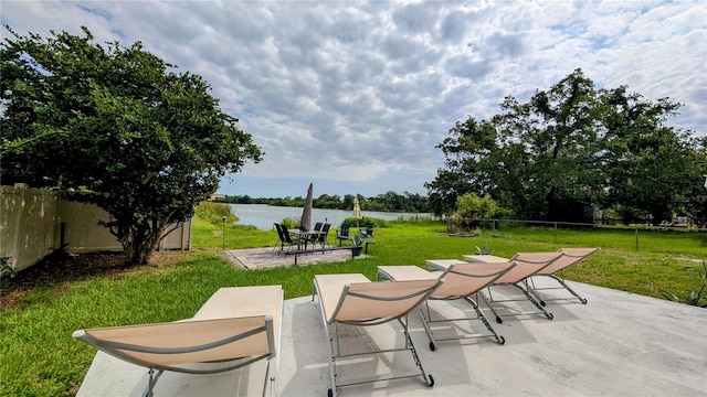 331 Greens End St, Orlando, FL 32810 - view of patio with a water view and outdoor dining space