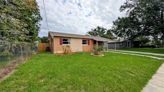 331 Greens End St, Orlando, FL 32810 - single story home featuring driveway, stucco siding, stone siding, and central AC unit