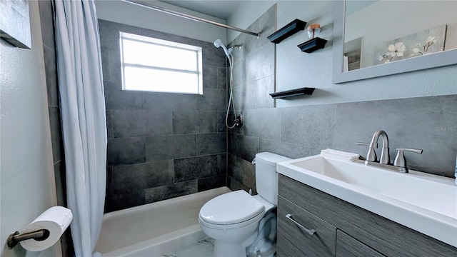 331 Greens End St, Orlando, FL 32810 - full bath with toilet, a tile shower, vanity, and tile walls