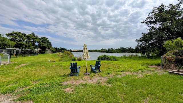 331 Greens End St, Orlando, FL 32810 - view of yard featuring a water view