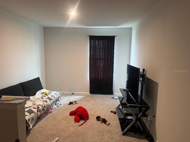 268 Fiddlewood Ct, Davenport, FL 33837 - carpeted bedroom featuring baseboards