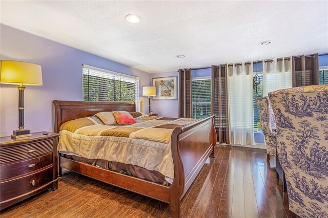 1919 E S St, Orlando, FL 32801 - bedroom with hardwood / wood-style floors, a textured ceiling, and recessed lighting