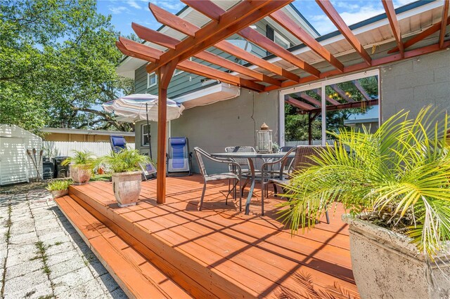 1919 E S St, Orlando, FL 32801 - deck featuring a pergola and outdoor dining area