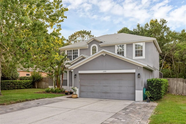1245 Reagans Reserve Blvd, Apopka, FL 32712 - traditional-style house with concrete driveway, a garage, and stucco siding