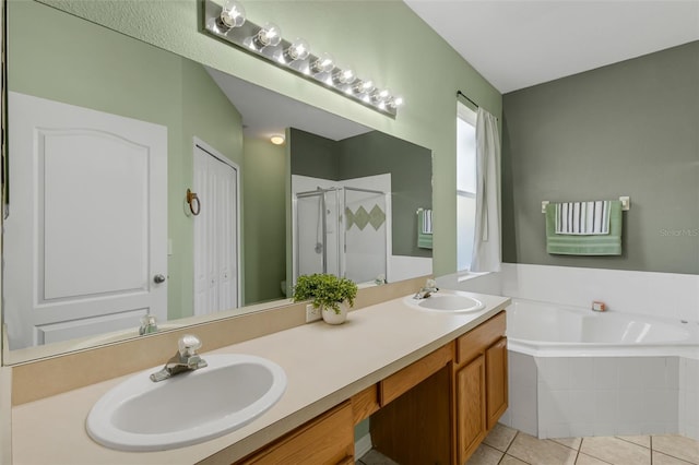 1245 Reagans Reserve Blvd, Apopka, FL 32712 - bathroom featuring a shower stall, double vanity, tile patterned flooring, and a bath