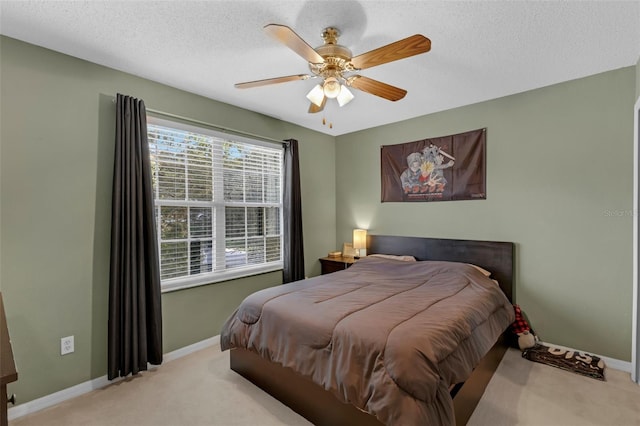 1245 Reagans Reserve Blvd, Apopka, FL 32712 - bedroom with carpet floors, baseboards, ceiling fan, and a textured ceiling