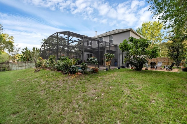 1245 Reagans Reserve Blvd, Apopka, FL 32712 - rear view of property featuring a fire pit, a lanai, and a patio area