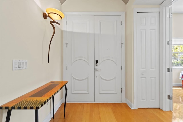 548 S Hyer Ave Unit 1, Orlando, FL 32801 - foyer entrance featuring light wood-type flooring and baseboards