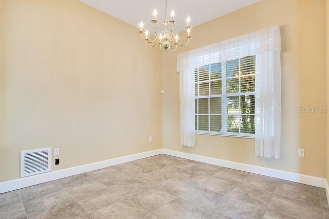 529 Quail Down Dr, Debary, FL 32713 - spare room with a chandelier and baseboards