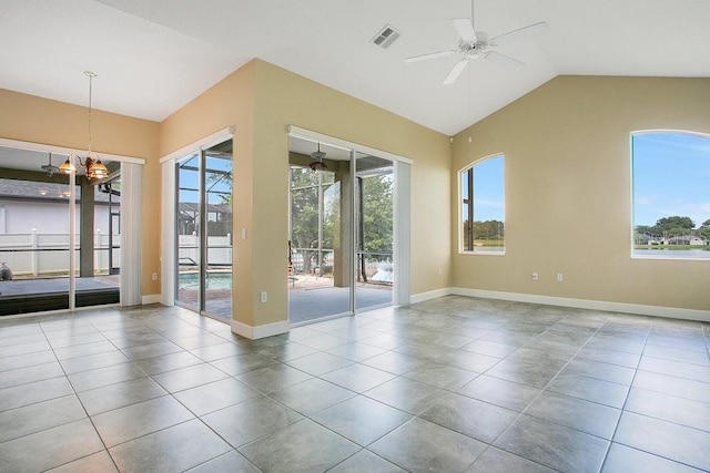 529 Quail Down Dr, Debary, FL 32713 - unfurnished room featuring a ceiling fan, tile patterned floors, a chandelier, lofted ceiling, and baseboards