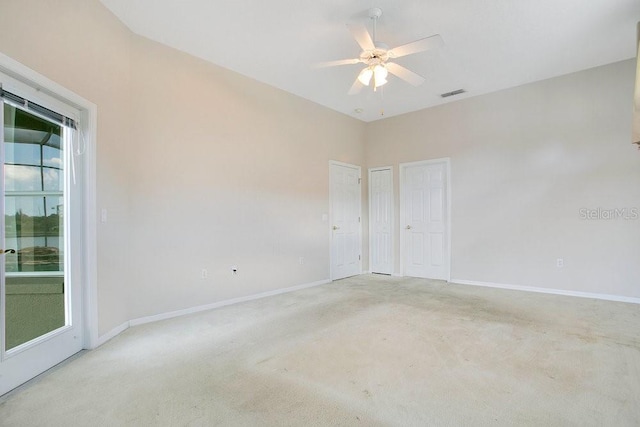529 Quail Down Dr, Debary, FL 32713 - spare room featuring a ceiling fan, light carpet, and baseboards