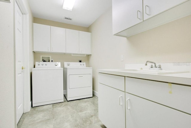 529 Quail Down Dr, Debary, FL 32713 - laundry room with cabinet space, separate washer and dryer, and baseboards