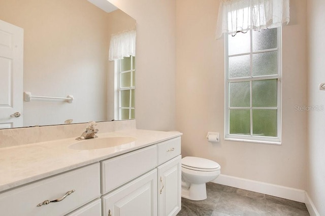 529 Quail Down Dr, Debary, FL 32713 - bathroom with vanity, toilet, and baseboards