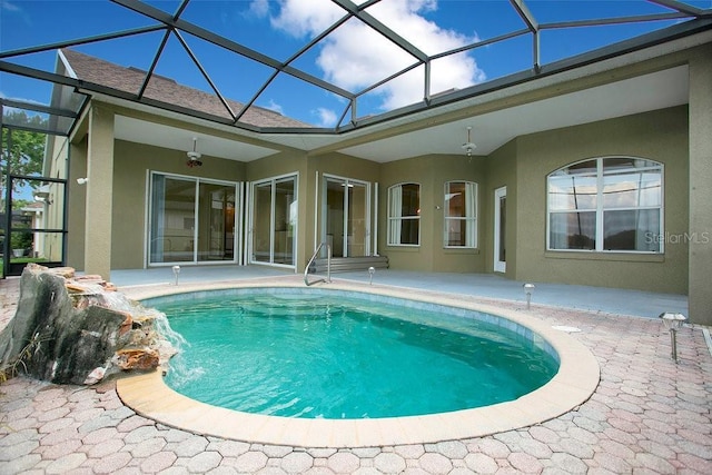 529 Quail Down Dr, Debary, FL 32713 - swimming pool with a patio and glass enclosure