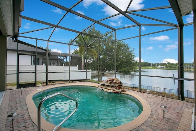 529 Quail Down Dr, Debary, FL 32713 - view of swimming pool with a water view, glass enclosure, and a patio