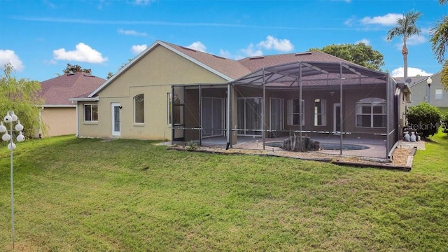 529 Quail Down Dr, Debary, FL 32713 - back of house with a lawn, a patio area, and stucco siding